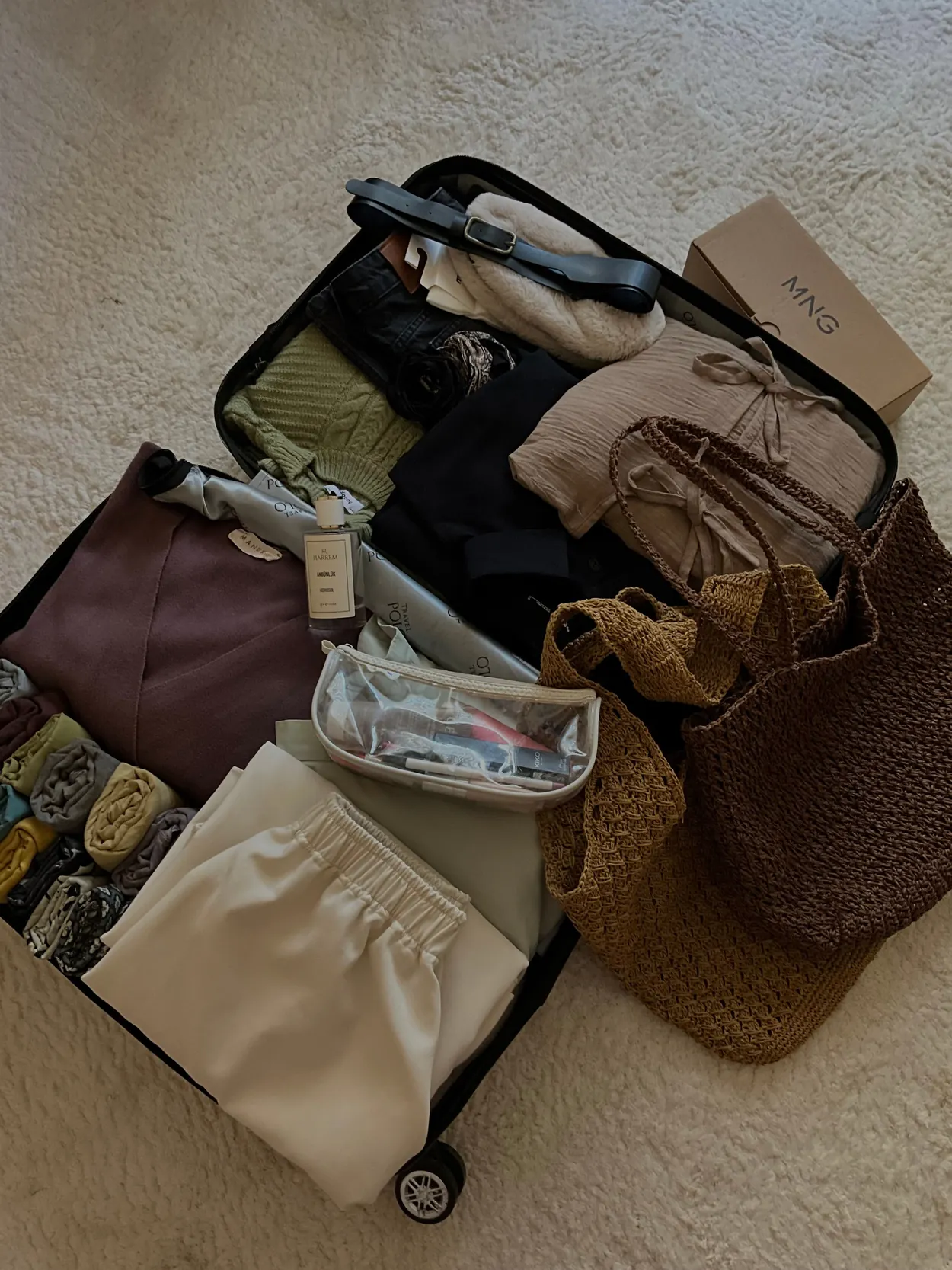 Organized clothes and travel essentials packed in a bag